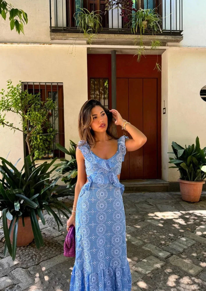 Blue circle patterned ruffle maxi dress for women, featuring a unique design with comfortable fabric perfect for a stylish…