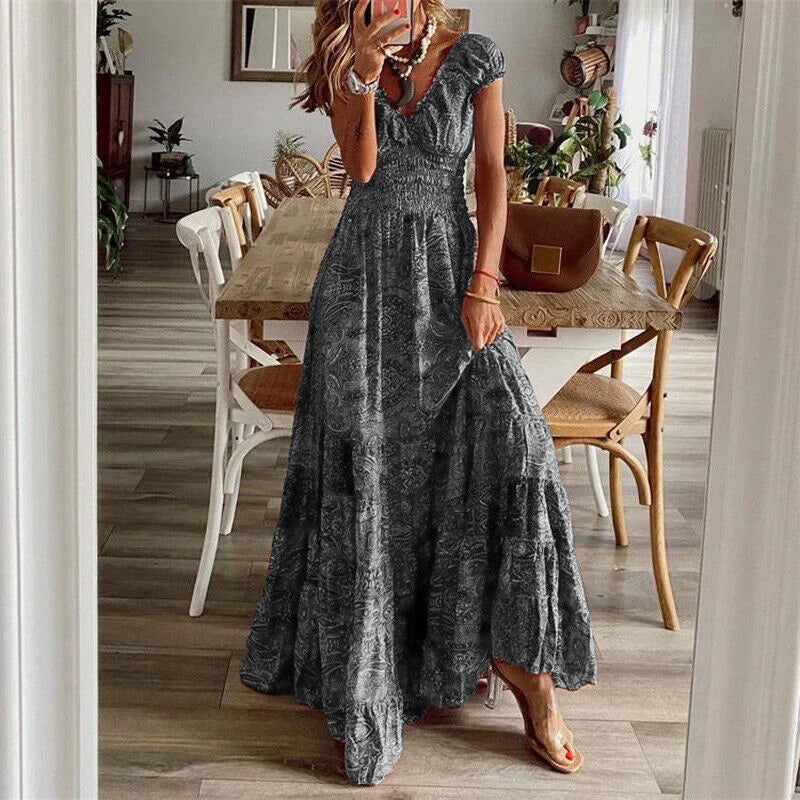 Gray V-neck tiered maxi boho dress featuring flowy design, ideal for casual or formal occasions.