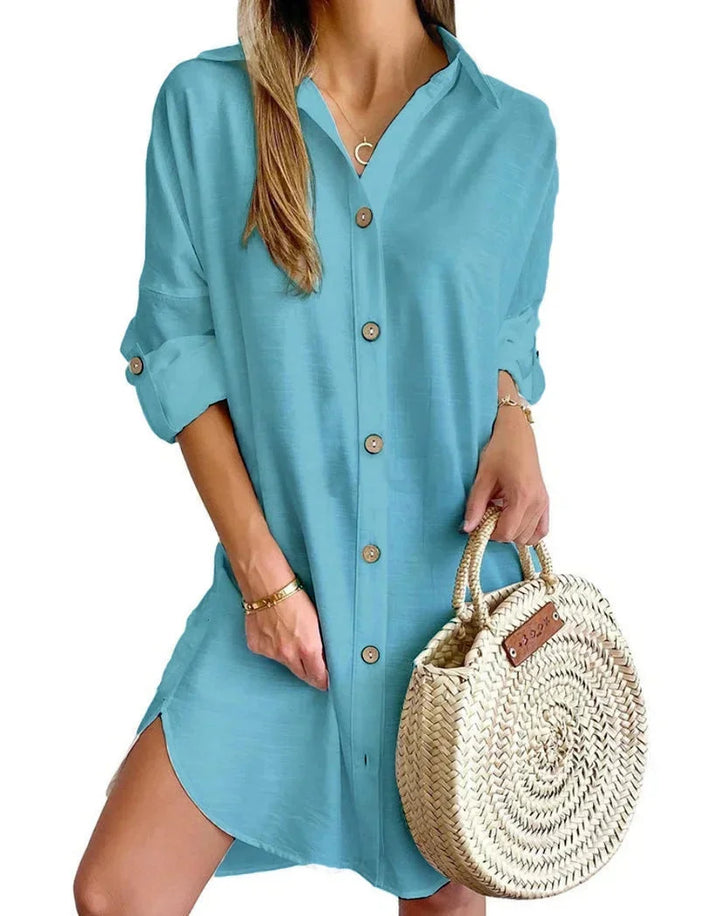 "Blue green button-up mini shirt dress for women, made of lightweight fabric with a unique design."