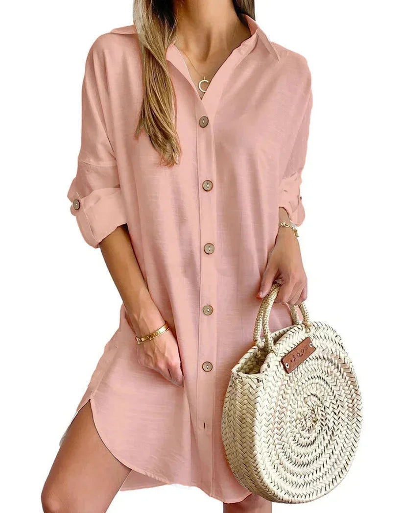 Pink button-up mini shirt dress for women, made from soft cotton blend fabric. Features include collared neckline and…