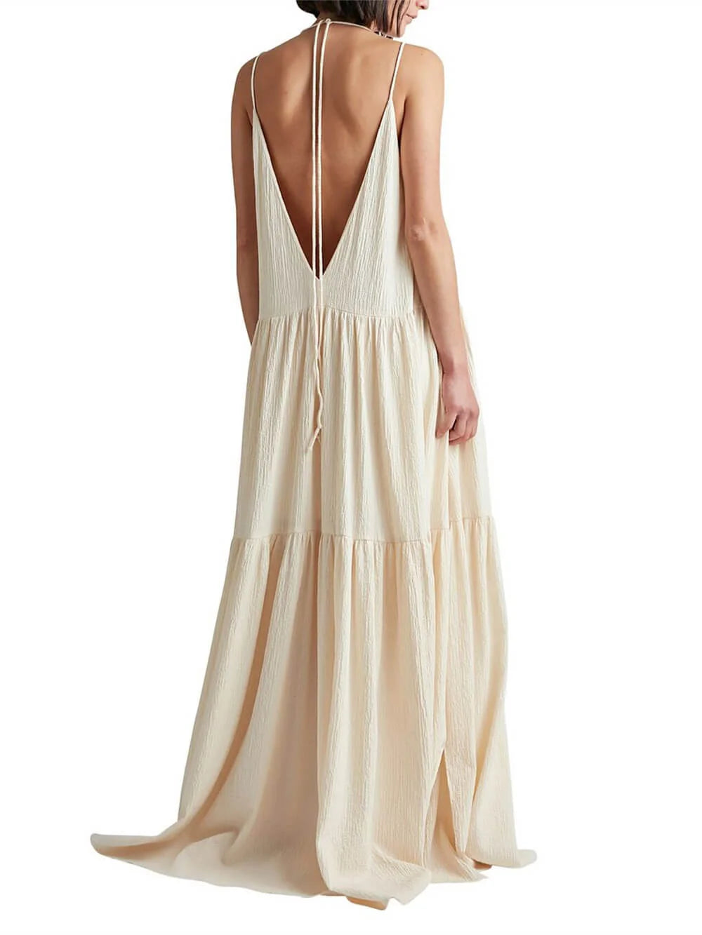 Cream V-neck maxi dress with tiered skirt, ideal for summer outings. Made from soft, flowing fabric for effortless style and…