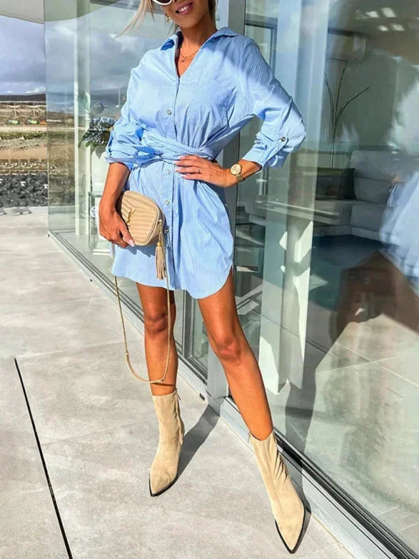 Belted shirt dress in a stylish design with rolled sleeves, made from high-quality fabric.