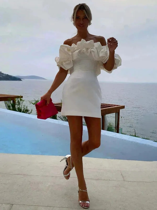 Off-shoulder dress with ruffles in a fitted cut for women. Made from soft fabric with a dramatic design perfect for special…