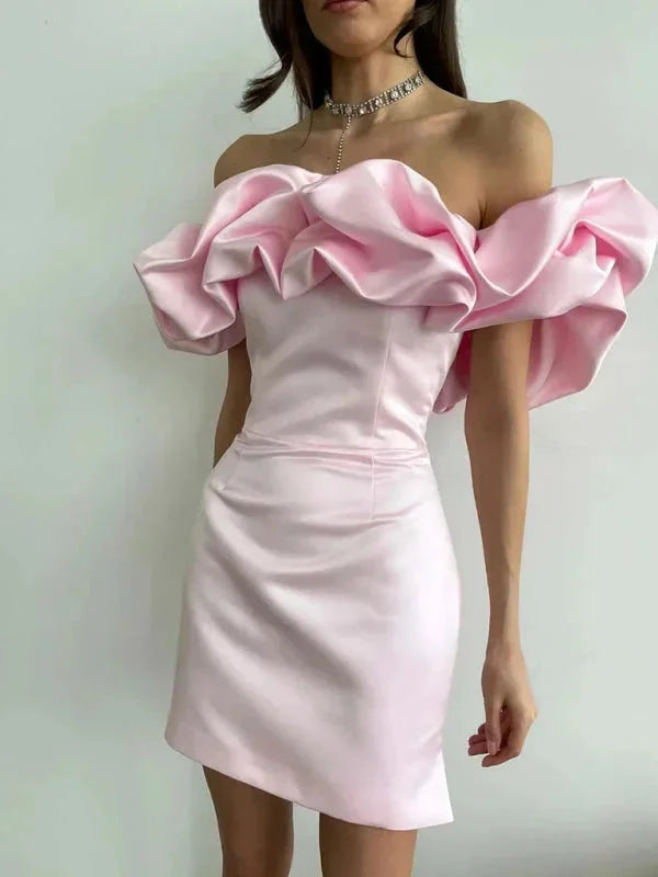 Pink off-shoulder dress with dramatic ruffles for women. Made of soft and lightweight material. Feminine and elegant design.
