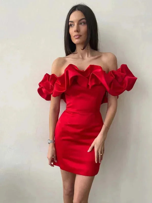 Red off-shoulder dress with ruffles for women, made of soft fabric. Feminine and trendy design perfect for any occasion.