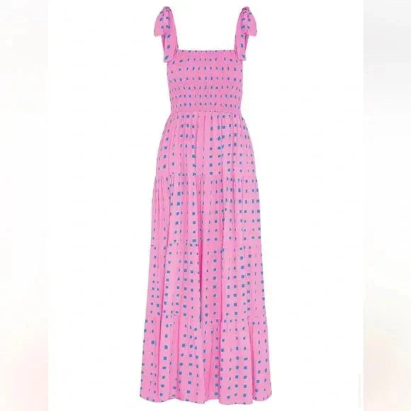 Women’s pink patterned maxi dress with tie straps featuring a soft, breathable fabric perfect for a relaxed summer look.