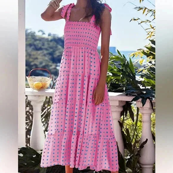 Pink patterned maxi dress with tie straps for women, perfect for a casual yet stylish look. Made of soft and breathable…