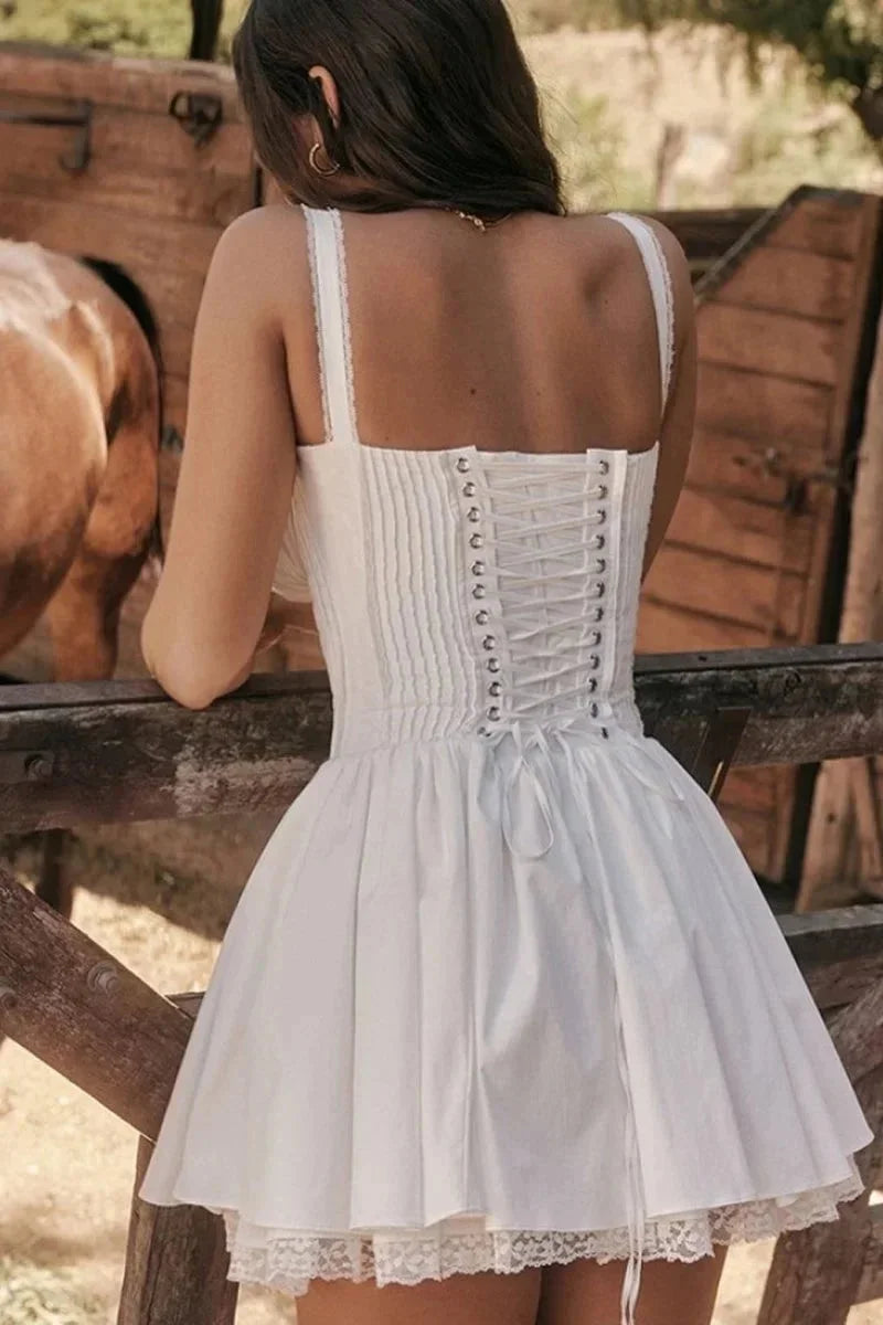 Munira Women's short dress crafted with ruffled straps, ideal for a casual day out or summer events.