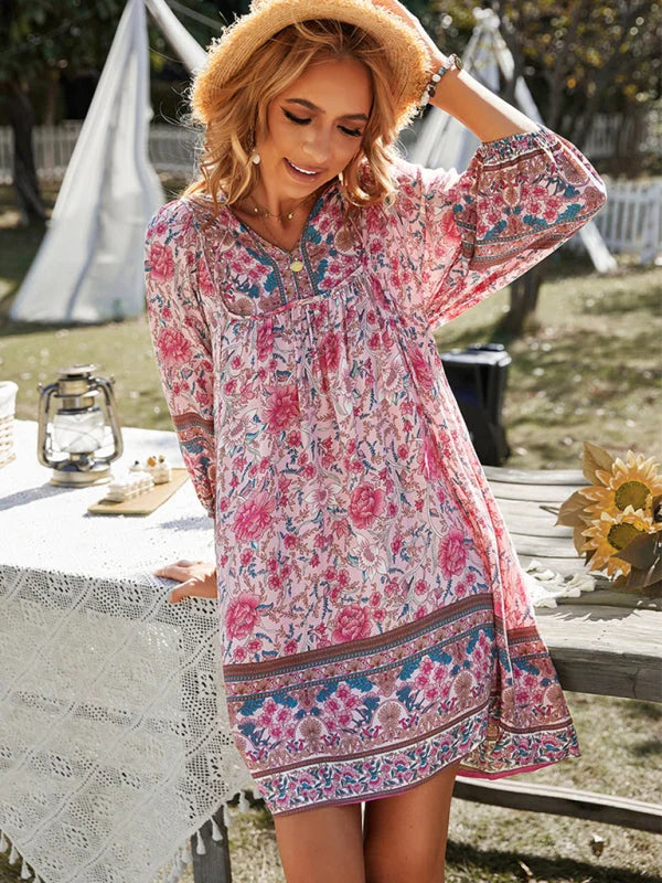 Flowy bohemian mini dress with floral patterns, perfect for effortless summer style with breathable and lightweight fabric.