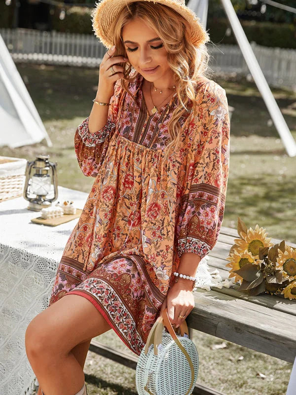 "Neveah Mini Dress with Bohemian florals, flowy silhouette, perfect for summer days with its lightweight fabric."