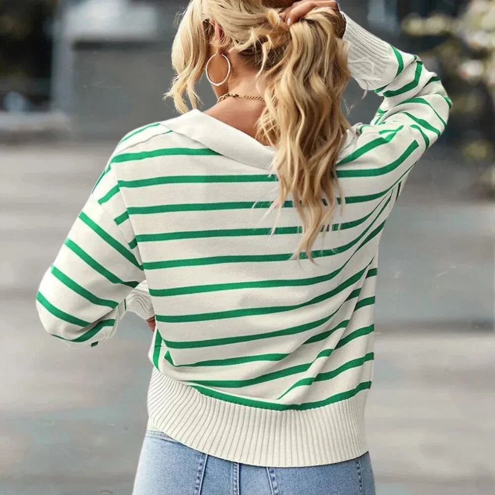 "Neylani striped sweater with a relaxed fit in soft knit fabric. Features classic stripes and a comfortable design for…