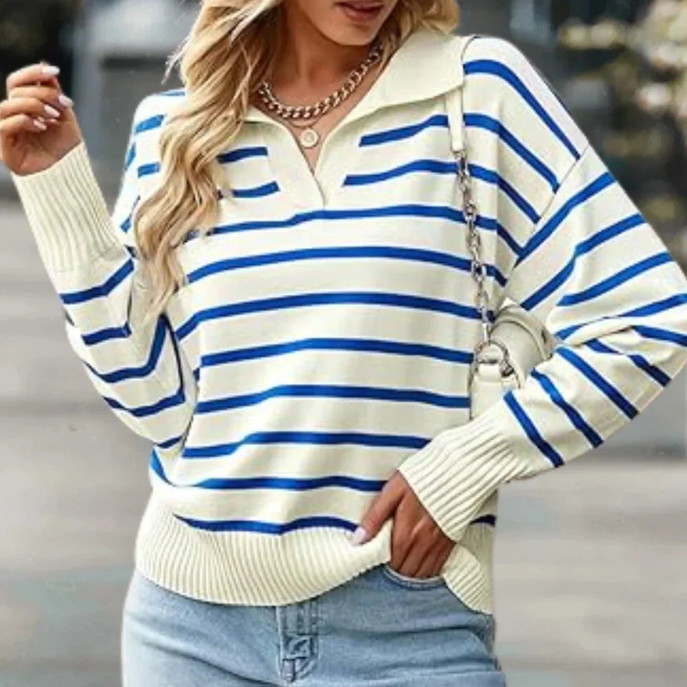 Blue striped sweater with relaxed fit, perfect for casual days. Made from soft and cozy material, featuring a classic…