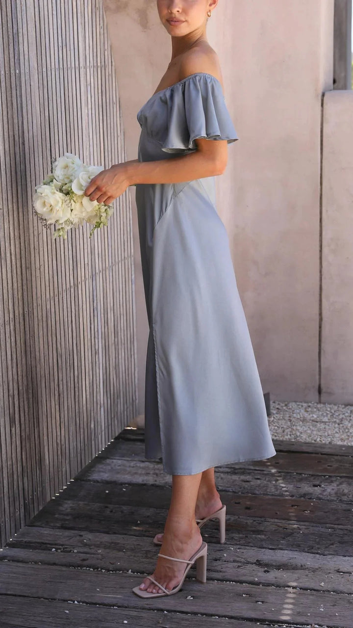 Off-shoulder maxi dress in black with side slits, made of premium blend fabric, stylish and elegant design perfect for a…