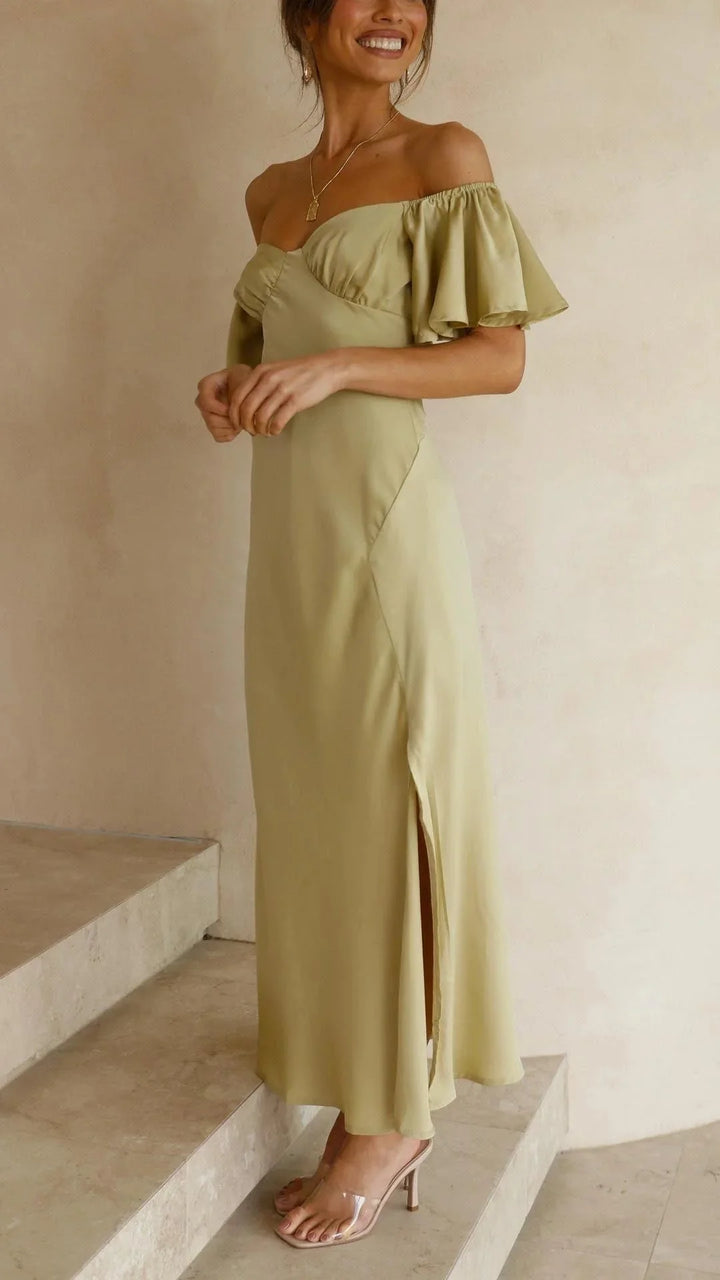 Off-shoulder maxi dress in flowy fabric with elegant slits design.