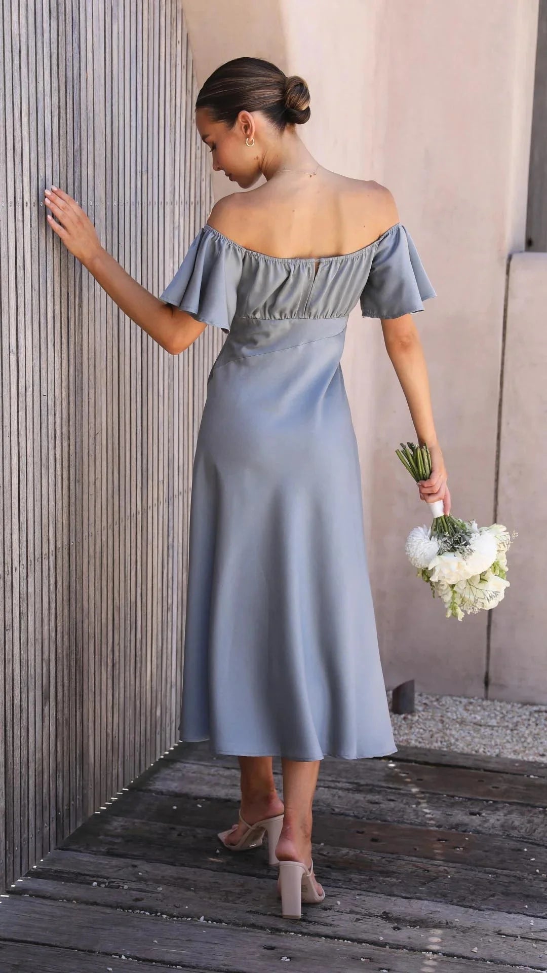 Off-shoulder maxi dress in black with unique slits, perfect for a chic, trendy look. High-quality fabric for all-day comfort…