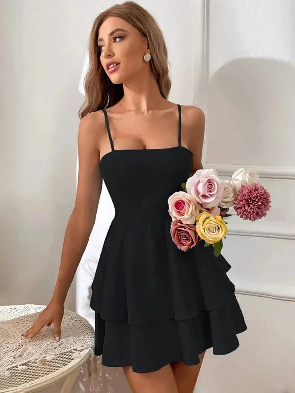 Women's flared dress with adjustable straps in elegant floral print on soft cotton fabric, perfect for casual summer days.