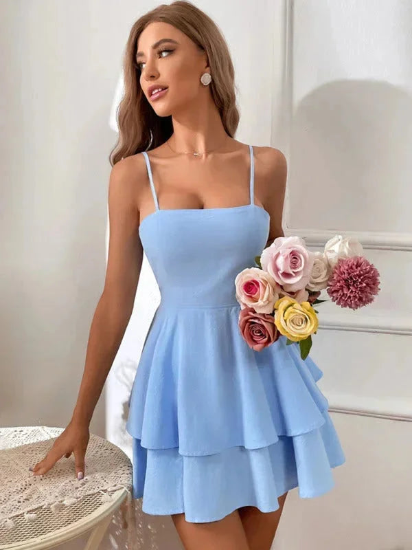 Women's flared dress in Blue, featuring adjustable straps for versatile styling. Made of soft textured fabric, a perfect…