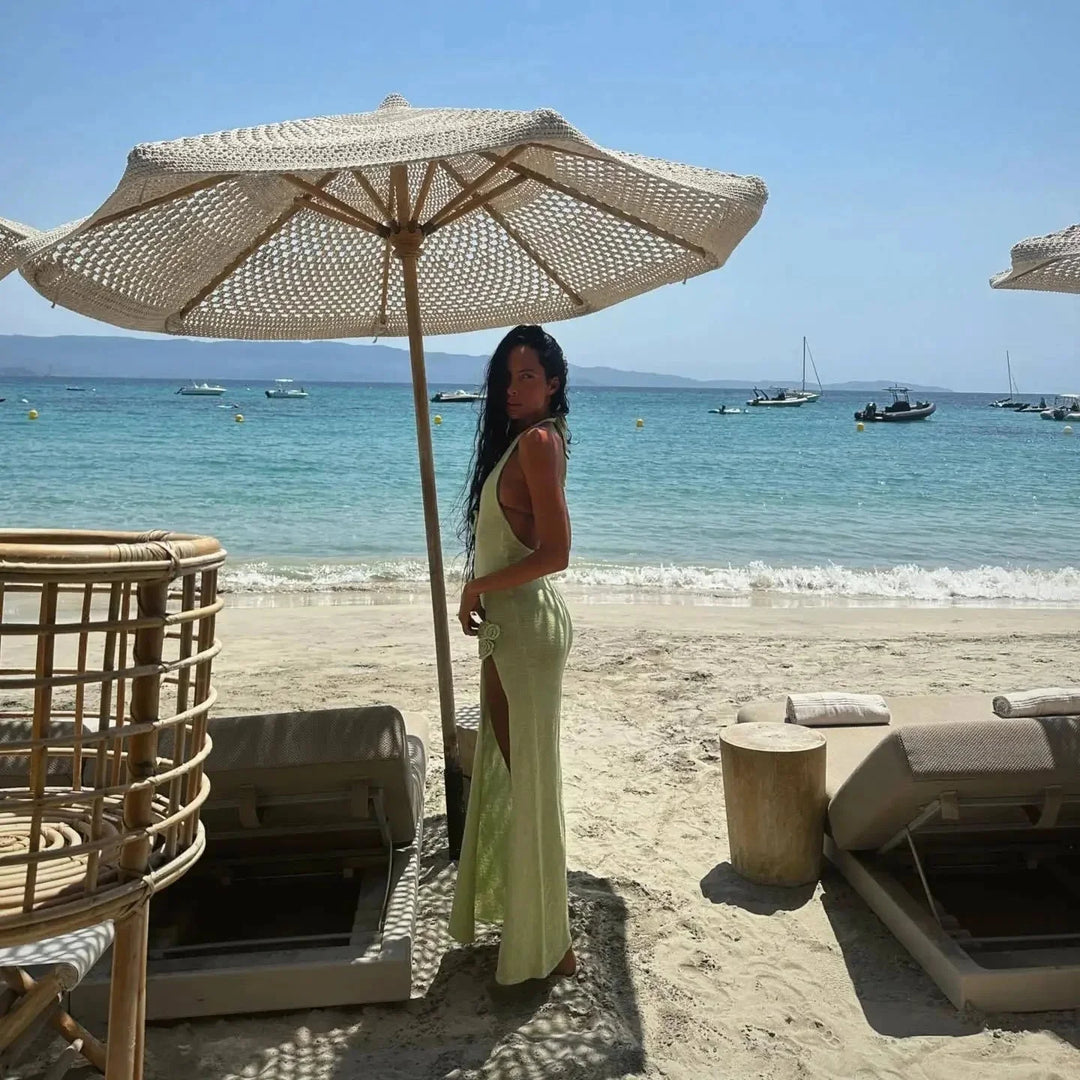 "Perri halter neck maxi dress featuring a chic side slit, ideal for a casual yet stylish look."