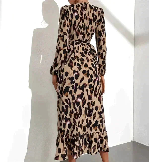 "Black flowing wrap dress with slit designed for women, featuring a stylish Phoenix pattern."