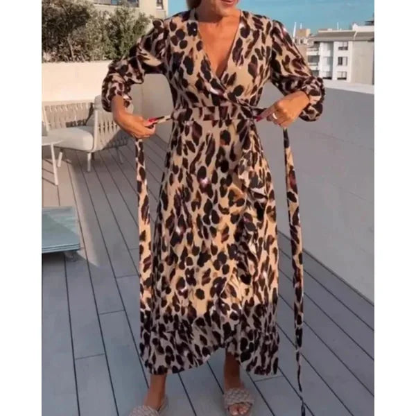 Phoenix women's wrap dress in flowy fabric, featuring a slit design.