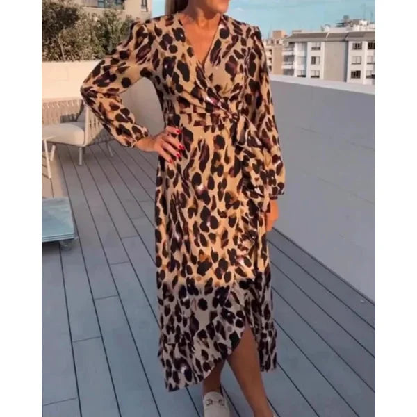 Brown women's wrap dress with slit, flowing design, made of soft and comfortable material. Perfect for casual outings or…
