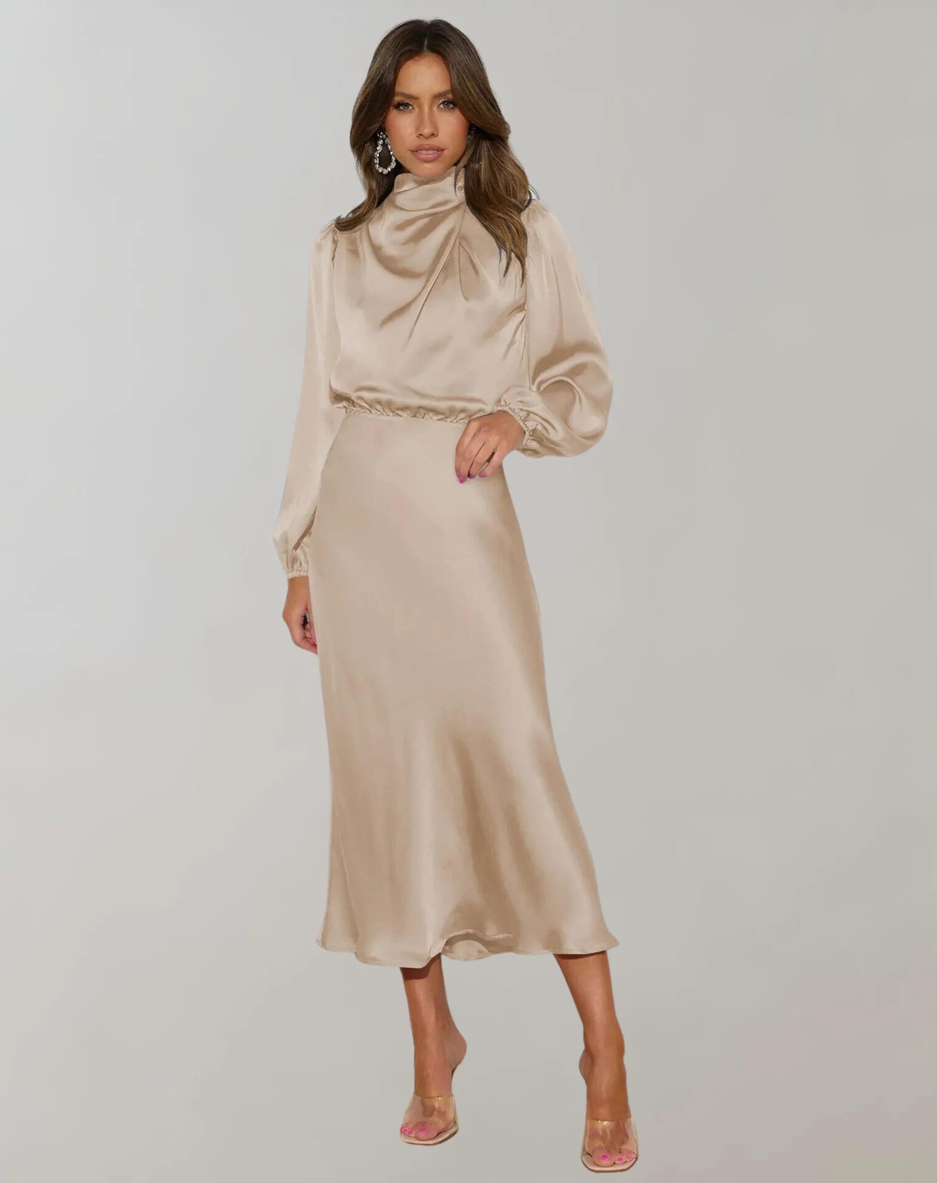 Beige satin dress with high neck, highlighting elegance through simple design.