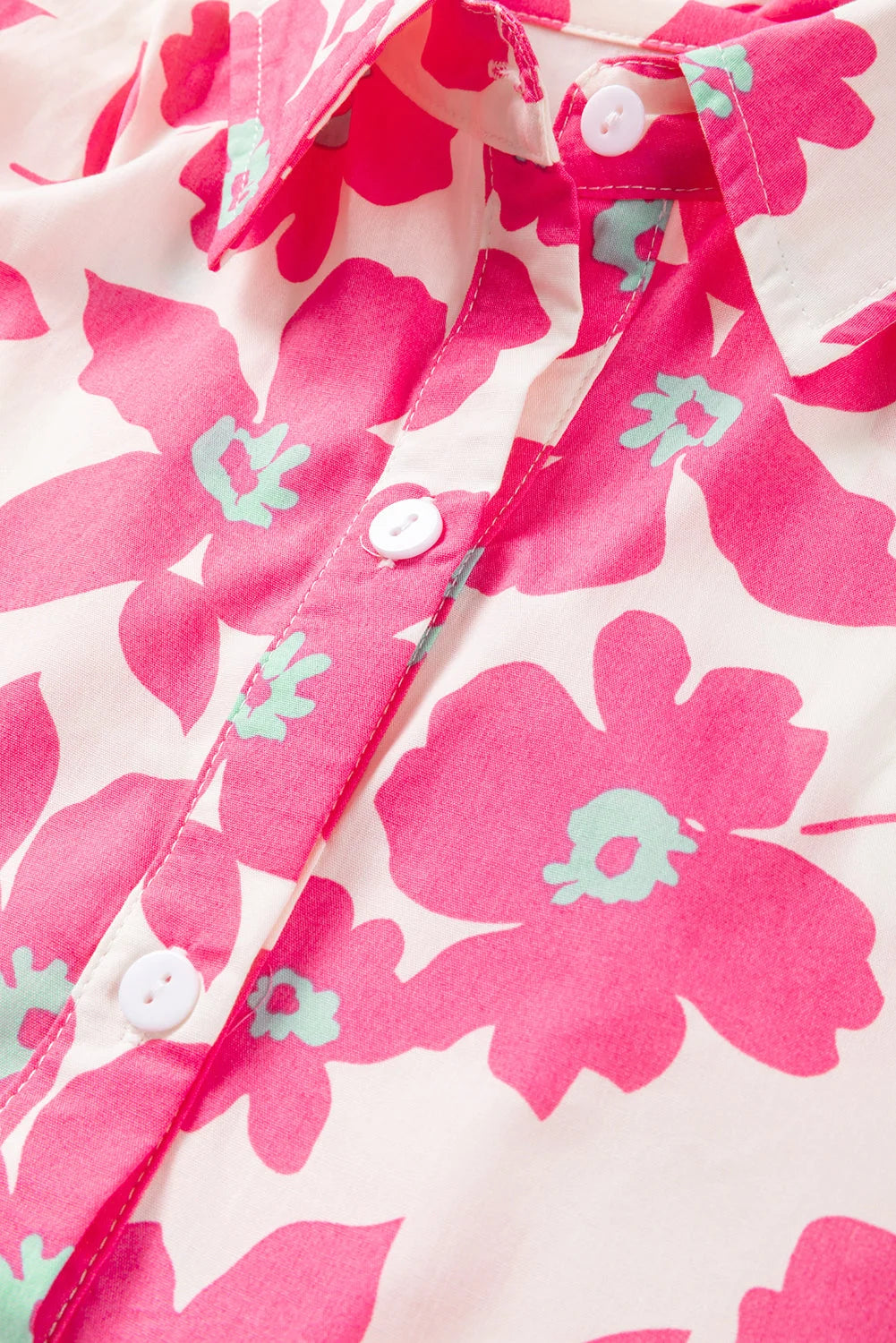 "Railynn pink tiered shirt dress featuring a floral print design, perfect for a casual day out or summer gatherings."