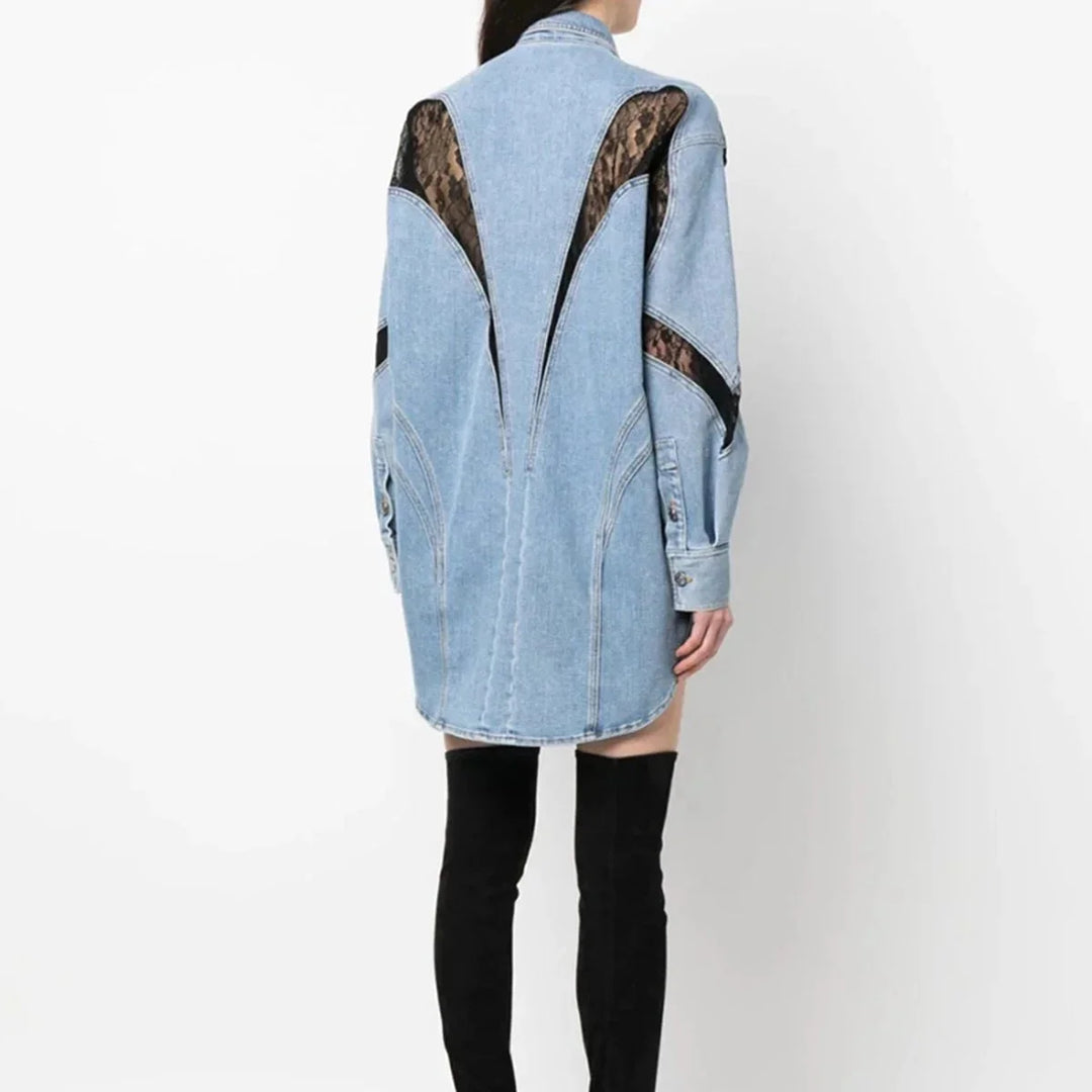 "Women's oversized blue denim dress with zippers, featuring a relaxed fit and modern design."