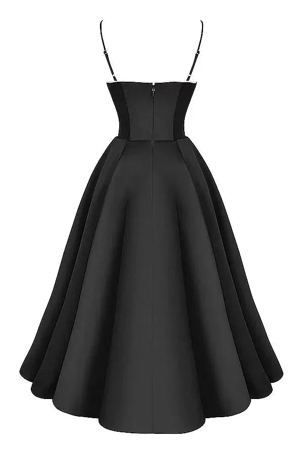 Black satin dress with cream tulle hem featuring a sophisticated and elegant design, ideal for formal occasions.