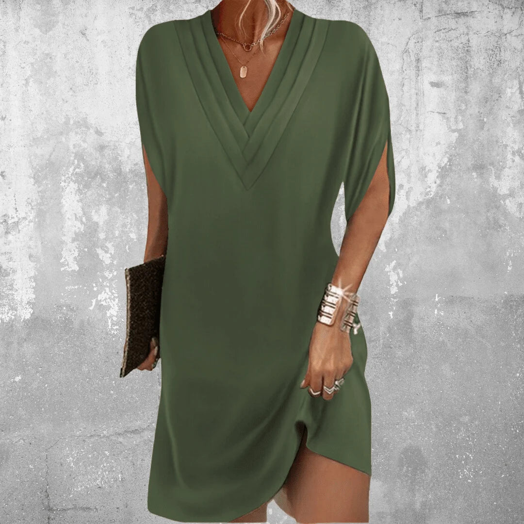 Military green wrap mini dress with a V-neck design. Made from soft and comfortable fabric. Stylish and versatile addition…