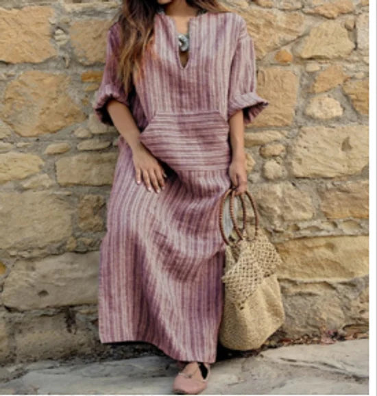 "Striped long-sleeve maxi dress featuring a comfortable blend of cotton and polyester for stylish everyday wear."