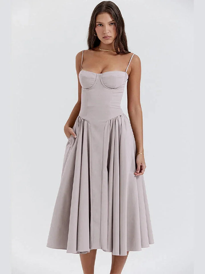 Light grey fitted bodice dress with flare, perfect for formal occasions. Made of high-quality fabric for a stylish and…