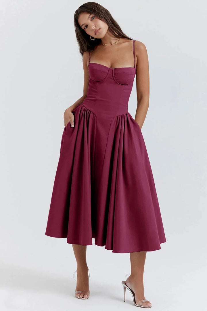 Plum red fitted bodice dress with flare for women made with soft cotton blend fabric.