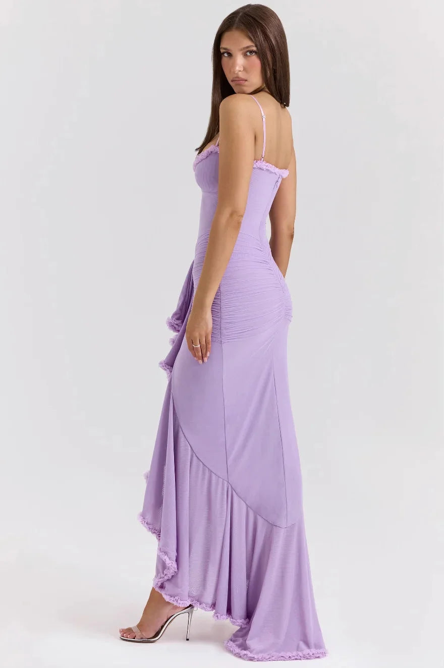 "Sakura midi dress for women with ruffled asymmetrical design, made of flowy fabric in a soft floral print."