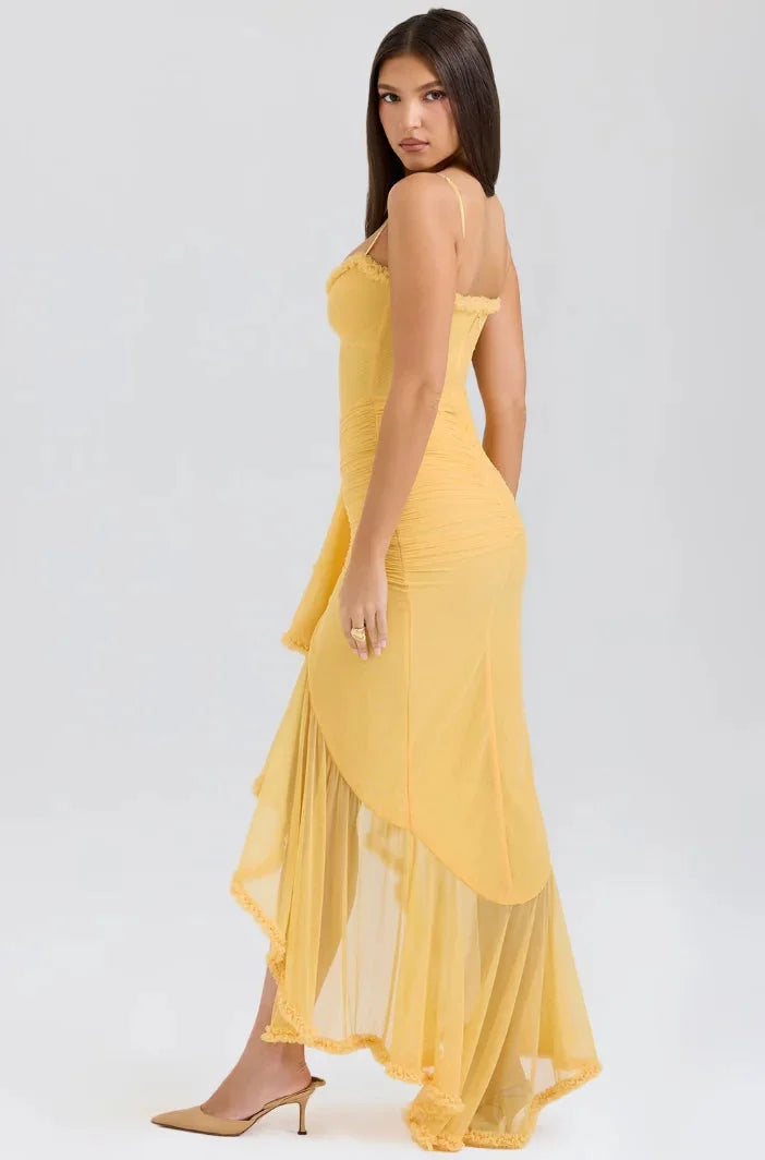 "Sakura midi dress with ruffled asymmetrical design, perfect for stylish and feminine look. Features light and airy fabric…