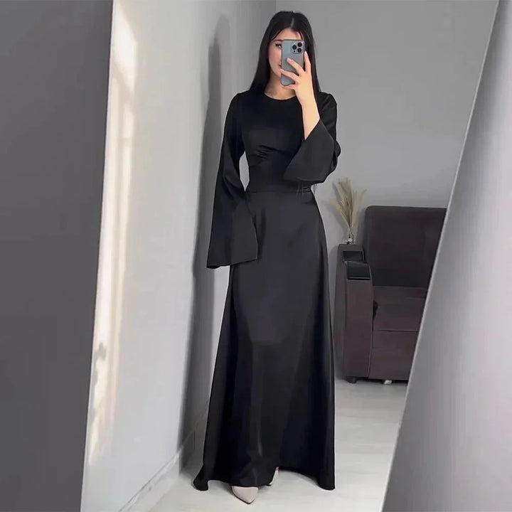 "Salome women's elegant full-length dress with sleeves, featuring a timeless design in high-quality fabric for a…