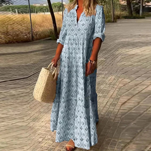 Flowy blue v-neck summer dress from Saray collection. Lightweight fabric with a relaxed fit. Perfect for a casual day out or…