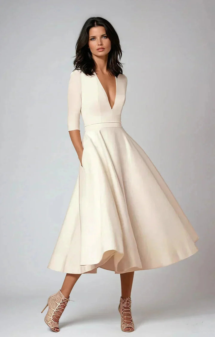 Beige deep v-neck flared midi dress for women by Sayori. Made of soft, breathable fabric with a stylish and flattering…