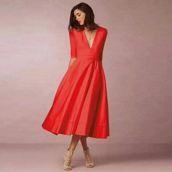 Red flared midi dress with deep V-neck for women by Sayori. Soft and comfortable fabric. Ideal for casual or formal…