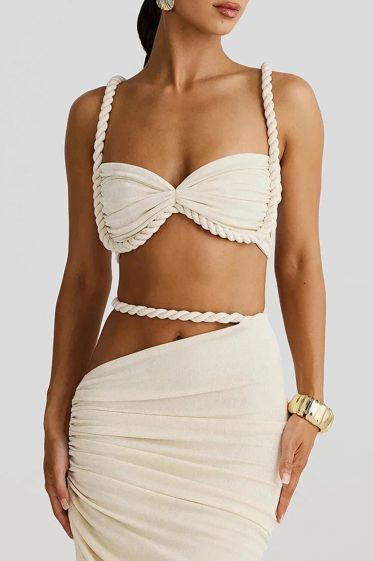 Cream maxi skirt for women with side ruching detail. Soft and stretchy fabric with a flattering design for a comfortable fit.