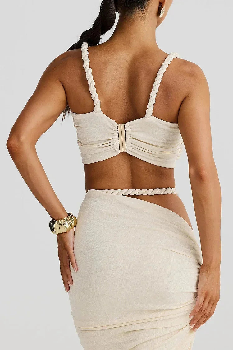 Cream-colored maxi skirt for women with side ruching detail. Soft and stretchy fabric, perfect for everyday wear or special…