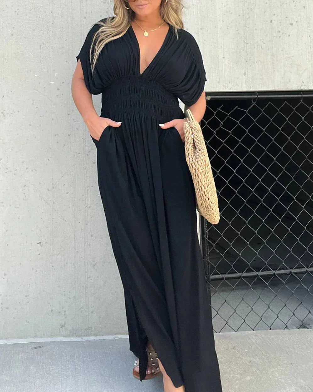 Flowy black maxi dress by Shanvi with a flattering fit. Made of lightweight, breathable fabric perfect for day or night wear.