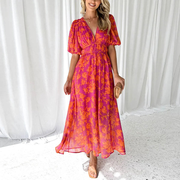 "Vibrant pink floral v-neck dress for women, made with soft and breathable fabric, perfect for summer outings."