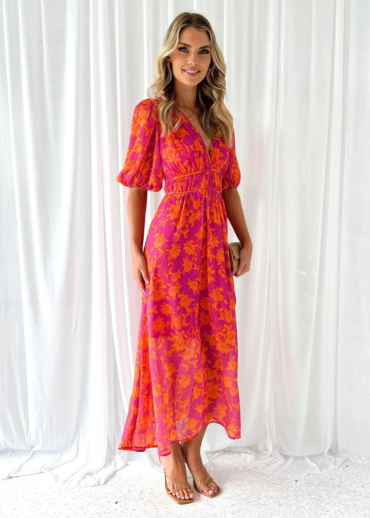 "Vibrant pink floral v-neck dress for women with a flowy design, perfect for a chic and stylish wardrobe."