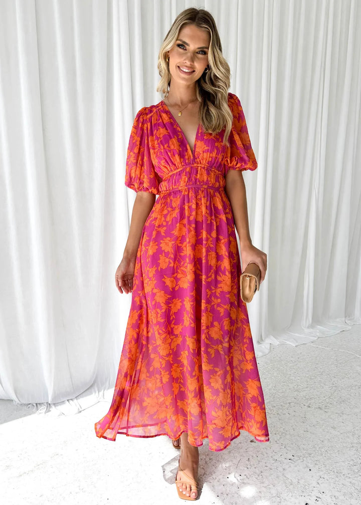 "Vibrant pink floral v-neck dress for women, featuring a stylish floral design, perfect for a pop of color in your wardrobe."