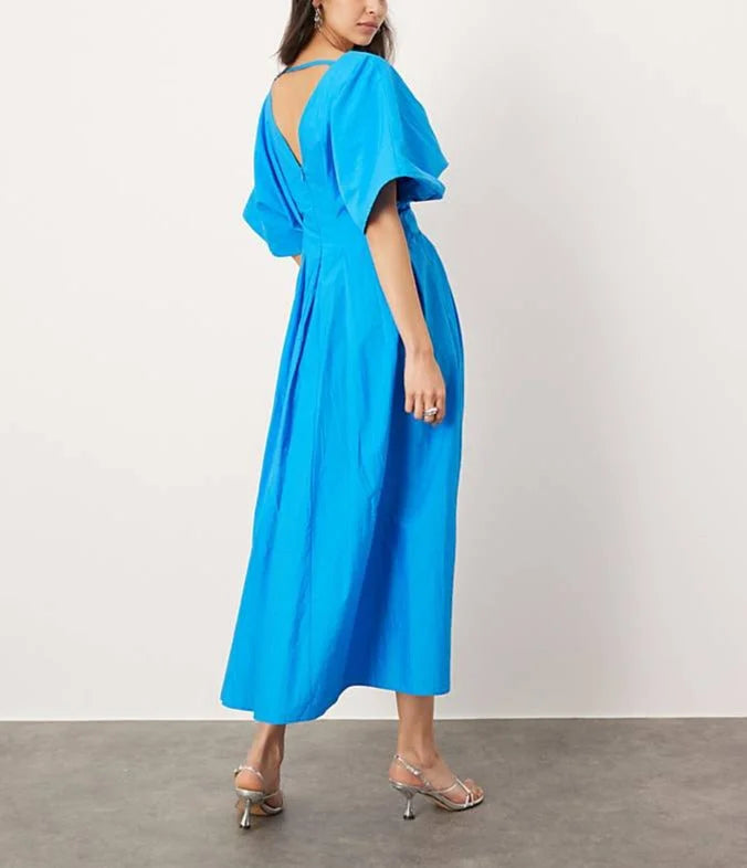 Electric blue V-neck midi dress by Siana. Made from high-quality fabric with a flattering silhouette and elegant design.