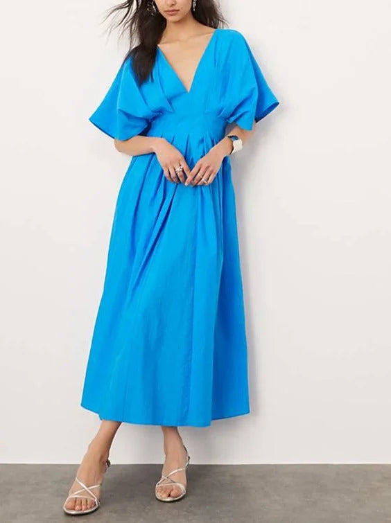 Electric blue V-neck midi dress made of soft cotton blend fabric with a flattering silhouette and elegant design by Siana.