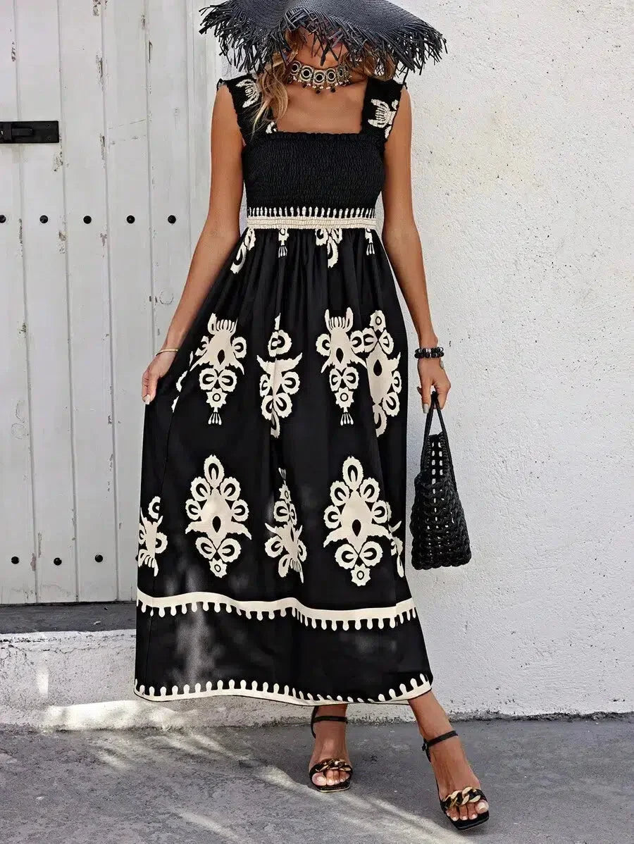 "Bohemian strapless maxi dress with floral print and flowing design, perfect for beach outings and summer casual wear."