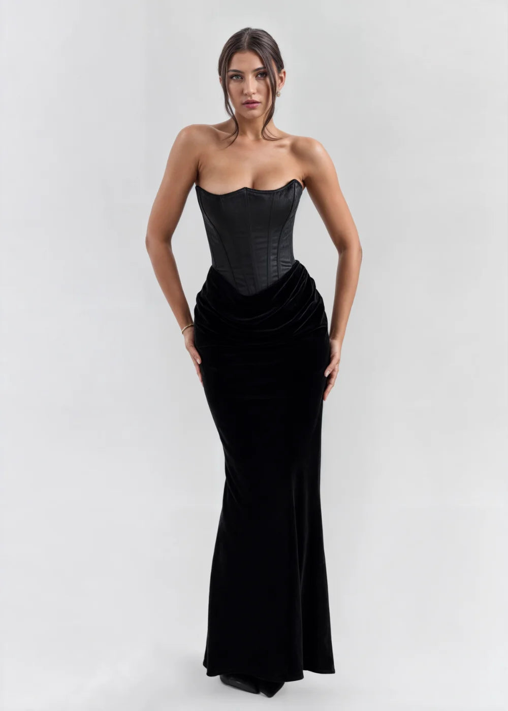 Black velvet strapless maxi dress, elegant and sophisticated.