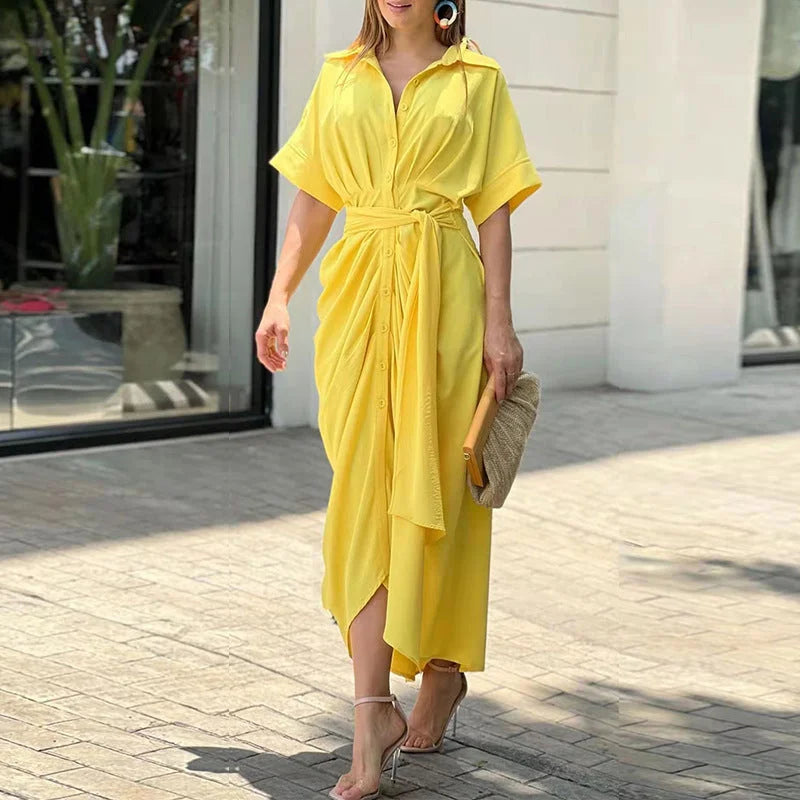 Yellow belted midi dress with abstract print. Made of soft lightweight fabric with a flattering silhouette. Perfect for…